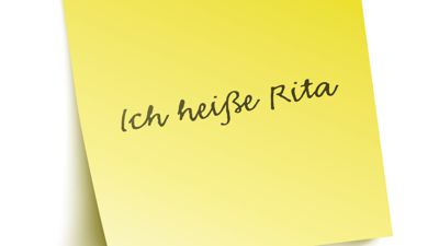 Gelber Notizzettel mit der Aufschrift: Ich heiße Rita