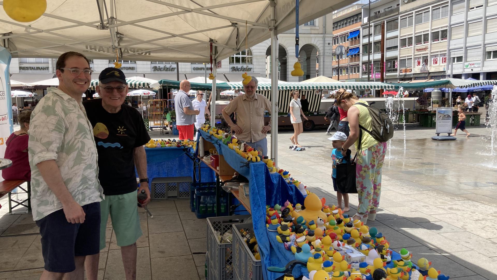 Rubber ducks are sold at the duck racing stand.