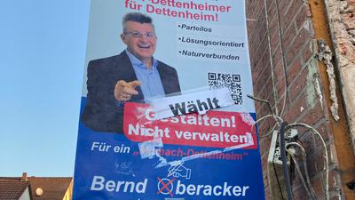 Wahlplakat von Bernd Oberacker mit abgerissenem „Wählt Frank“-Aufkleber