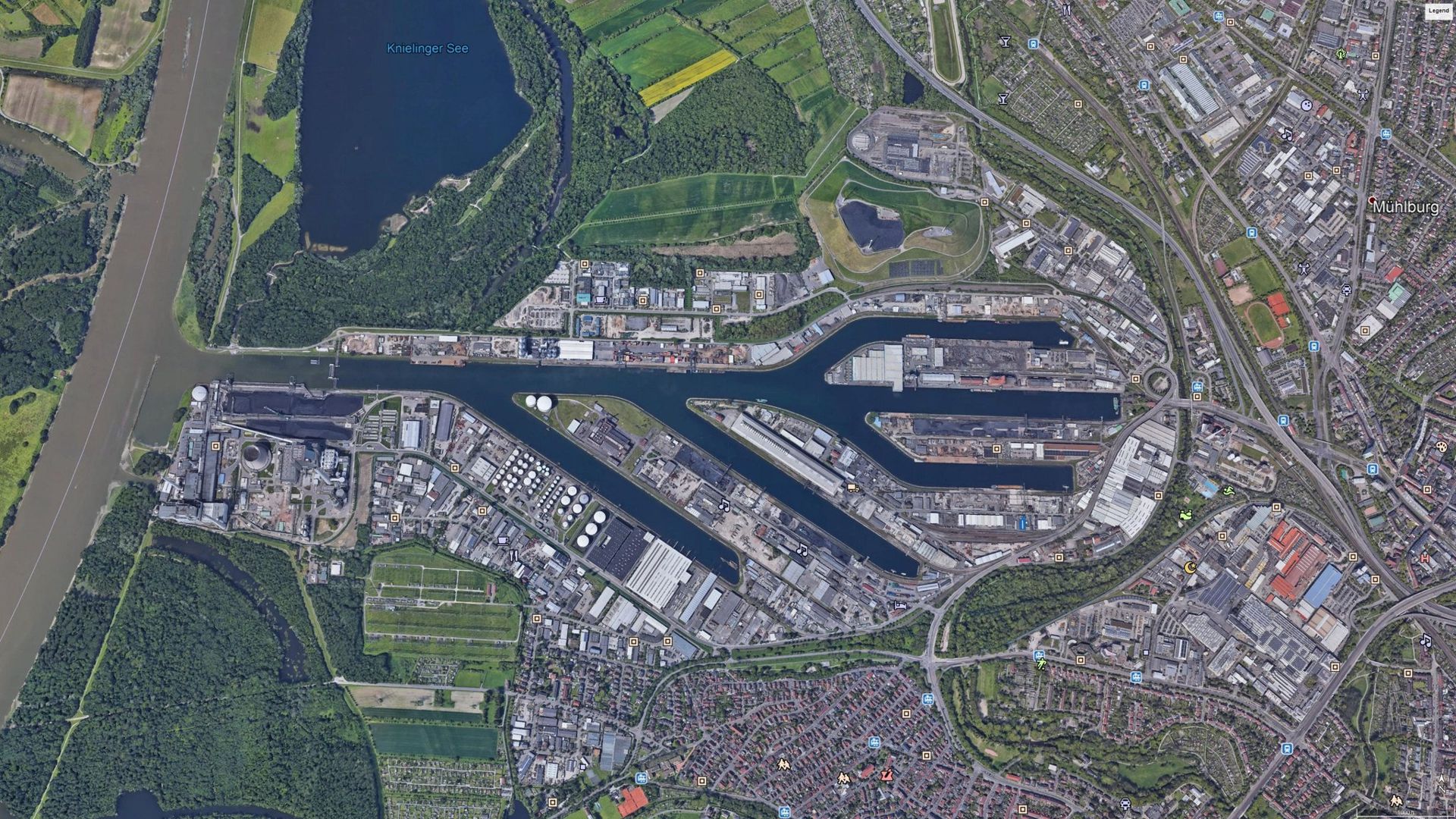 Satellitenfoto oder USB-Symbol? Der Karlsruher Rheinhafen vom All aus gesehen. Dort betreibt die EnBW das Dampfkraftwerk RDK.
