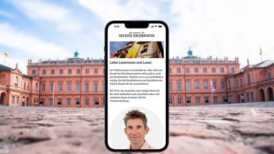 Ein Handy mit einem geöffneten BNN-Newsletter vor dem Schloss Rastatt.