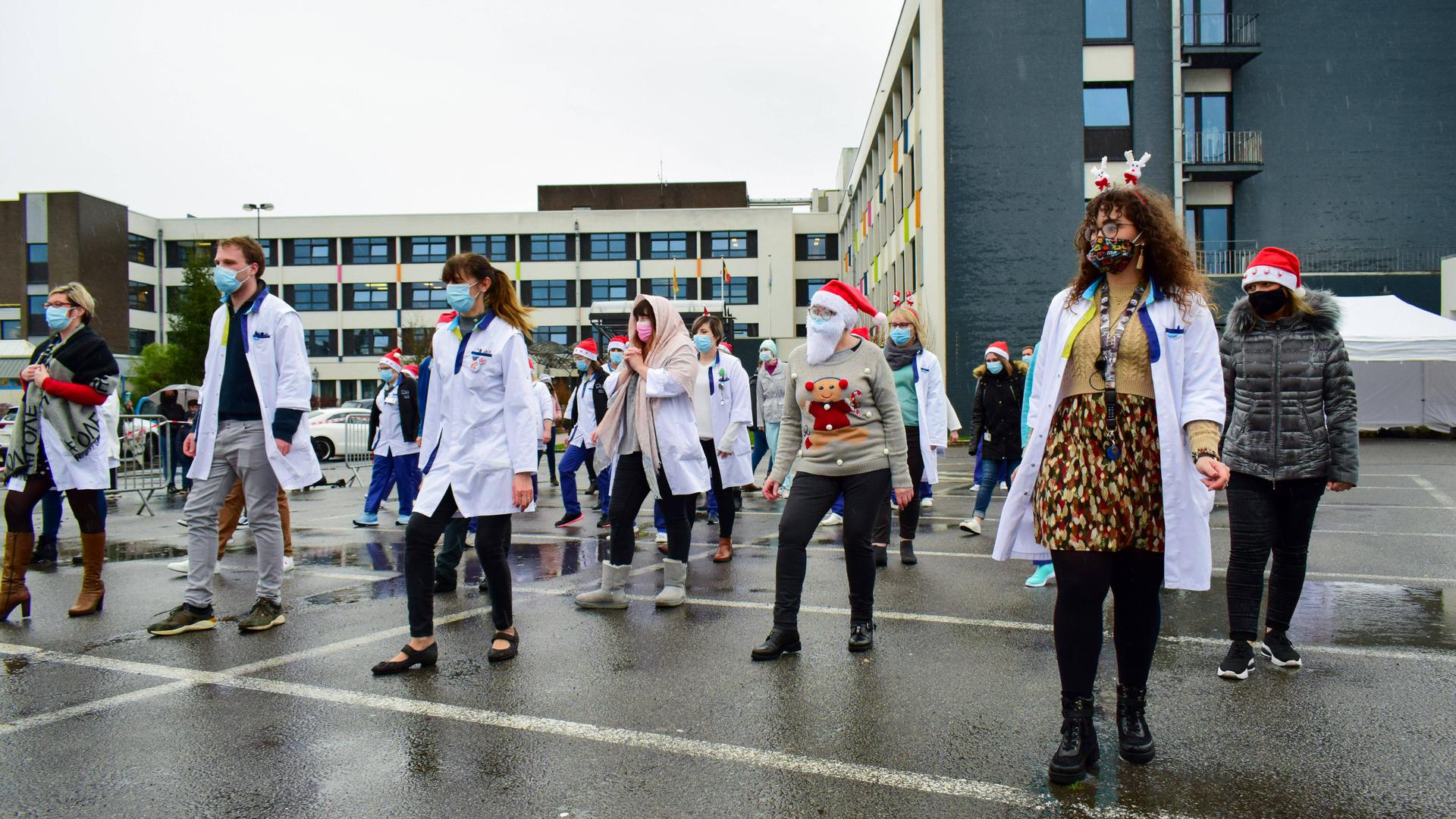 Illustration picture shows a flash-mob dancing moment on Jerusalema of the staff of the CHR Sambre et Meuse hospital in Sambreville, Monday 21 December 2020. PUBLICATIONxINxGERxSUIxAUTxONLY MAXIMExASSELBERGHS 2616060 