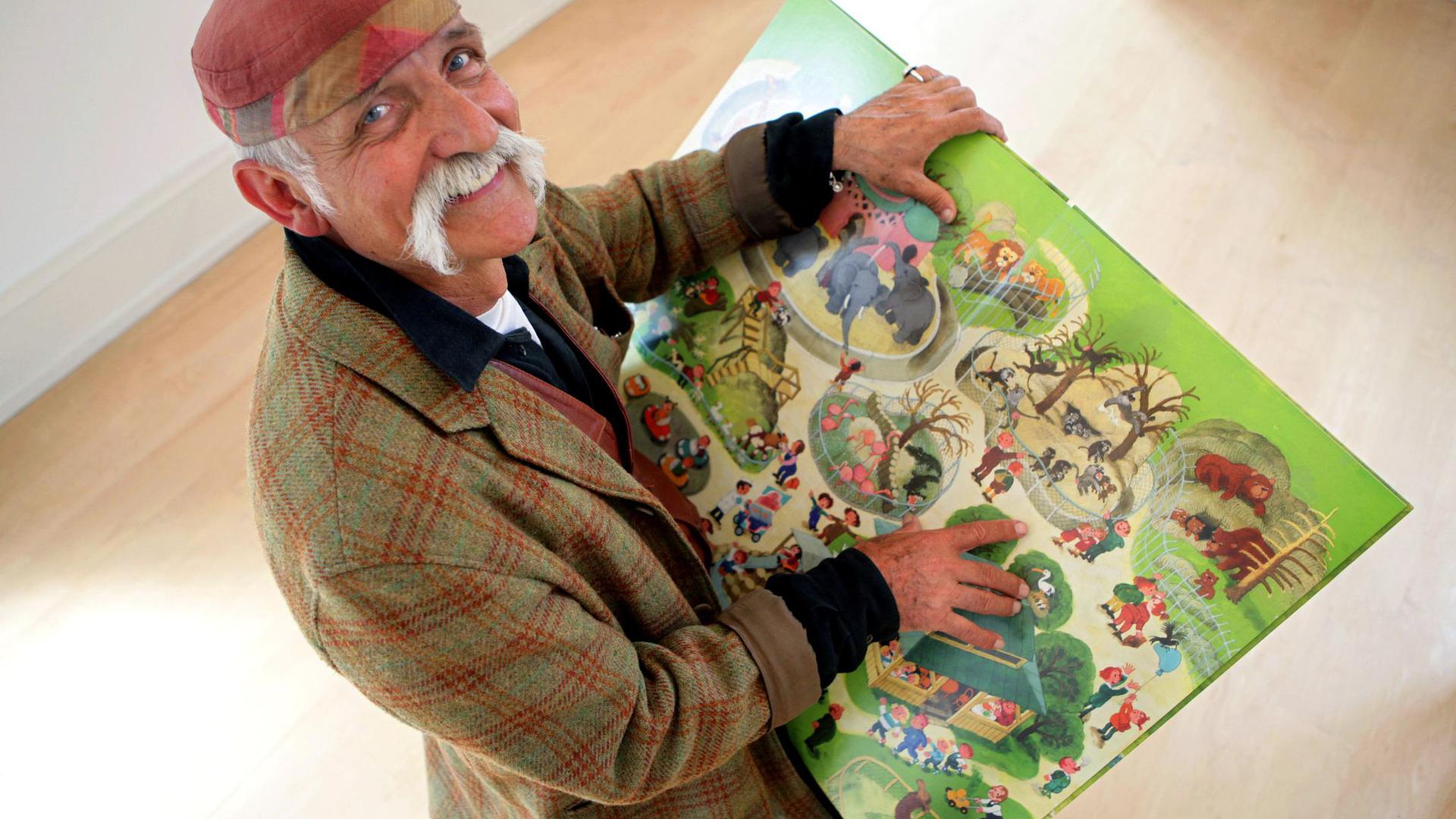 In seinen Wimmelbüchern kann man auf Reisen gehen: Ali Mitgutsch ist im Alter von 86 Jahren gestorben.