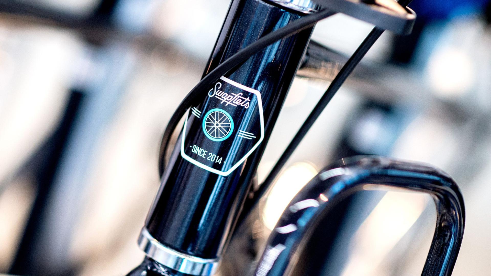 Das Logo des Unternehmens Swapfiets. Das Fahrrad-Abo-Unternehmen will in weitere Länder expandieren.