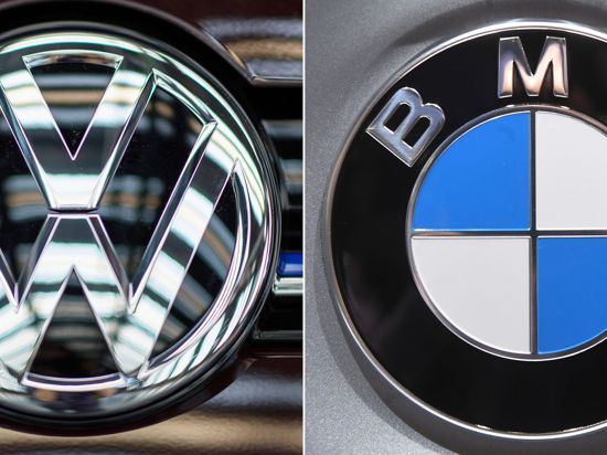 Die Logos der Automobilhersteller VW und BMW. Die EU-Kommission hat gegen die beiden deutschen Autobauer Wettbewerbsstrafen in dreistelliger Millionenhöhe verhängt.