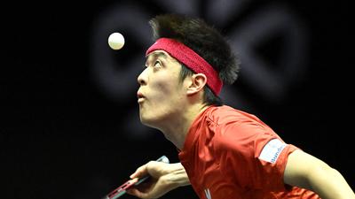 Germany�s Dang Qiu competes against Japan�s Tomokazu Harimoto (not in picture) during the men�s single match of the World Table Tennis Champions European Summer Series 2022 in Budapest, Hungary on July 20, 2022. (Photo by Attila KISBENEDEK / AFP)